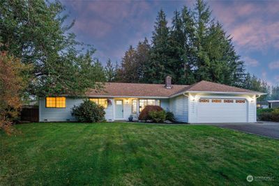 Magnificent Remodeled Rambler nestled on a 1/2 Acre at the end of a cul-de-sac. | Image 1