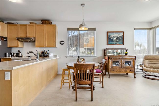 Dining room with plenty of natural light | Image 14