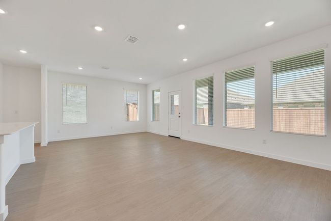 Unfurnished room featuring recessed lighting and light wood-style flooring | Image 4