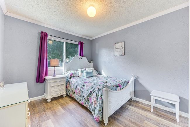 Thoughtfully placed within the home, the guest bedrooms provide privacy and flexibility without sacrificing comfort | Image 17
