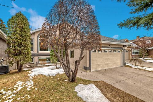 56 Mc Kenzie Lake Crescent Se, Home with 5 bedrooms, 3 bathrooms and 8 parking in Calgary AB | Card Image
