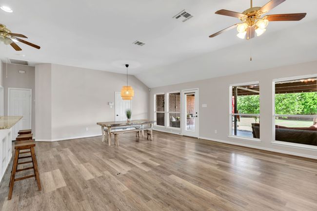 Family Room featuring Lots of Windows that open to Hugh Patio and Extra Large Backyard | Image 17