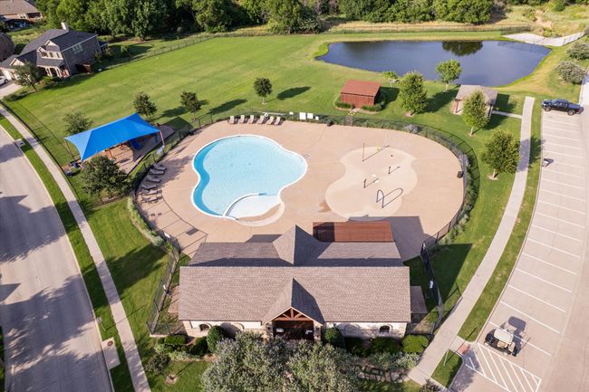 Aerial view of a large body of water and a pool area | Image 39