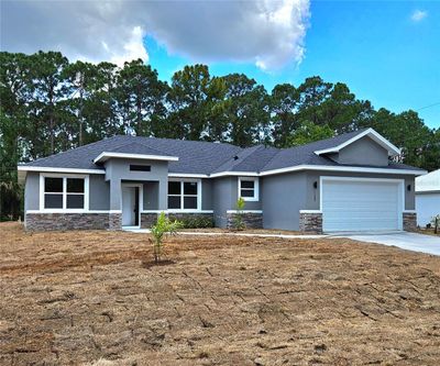 1982 Red Bud Circle Nw, House other with 4 bedrooms, 3 bathrooms and null parking in Palm Bay FL | Image 3