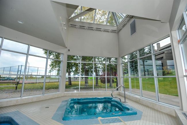 7 - 304 Village Mews Sw, Condo with 2 bedrooms, 2 bathrooms and 1 parking in Calgary AB | Image 27