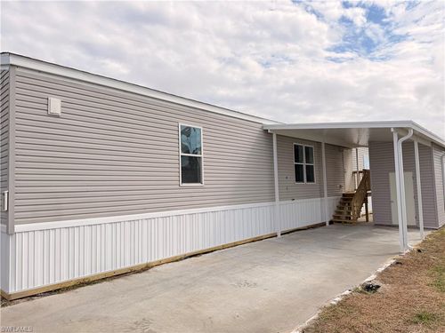 827 Peaceful Dr, NORTH FORT MYERS, FL, 33917-6384 | Card Image