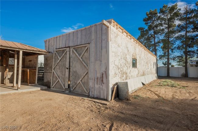 Detached garage in rear of property. | Image 43