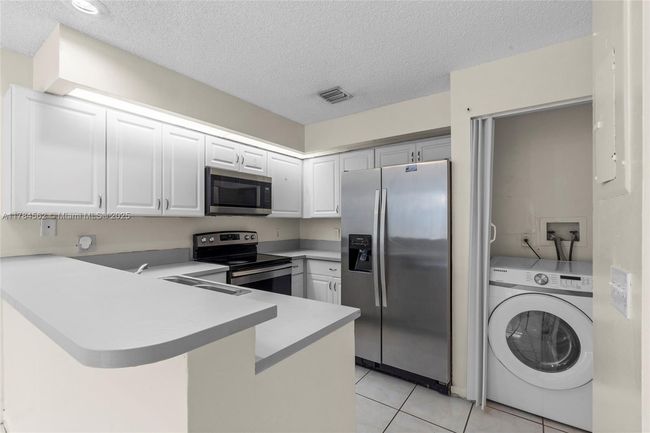 1903 Players Pl, Townhouse with 2 bedrooms, 2 bathrooms and null parking in North Lauderdale FL | Image 7