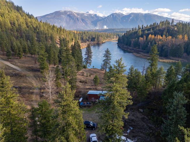 Bird's eye view featuring a water and mountain view | Image 16
