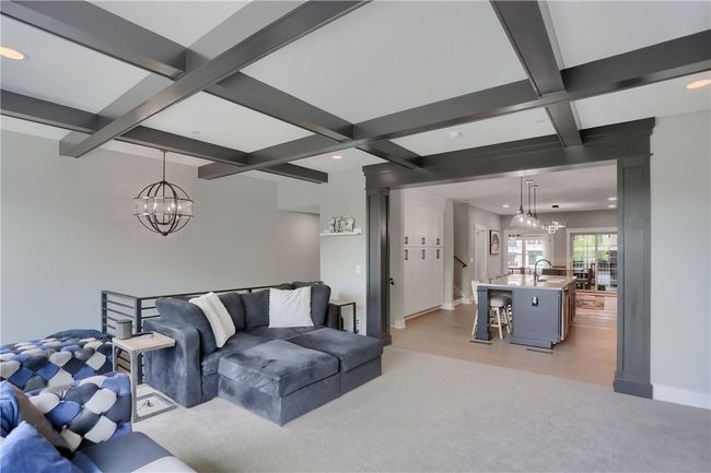 Half bath locate don main floor showcases an accent wall. | Image 22