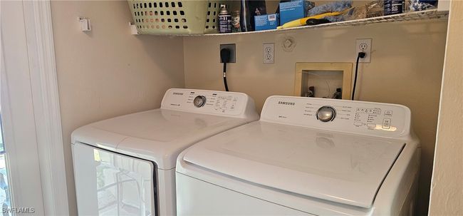 Laundry room with independent washer and dryer and laundry area | Image 13