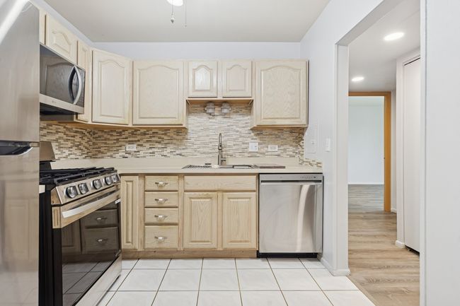 UNIT-206 - 720 Wellington Ave, Condo with 2 bedrooms, 2 bathrooms and 2 parking in Elk Grove Village IL | Image 4