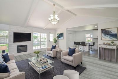 Beautiful family room with high ceilings and lots of natural light! *virtually staged* | Image 2