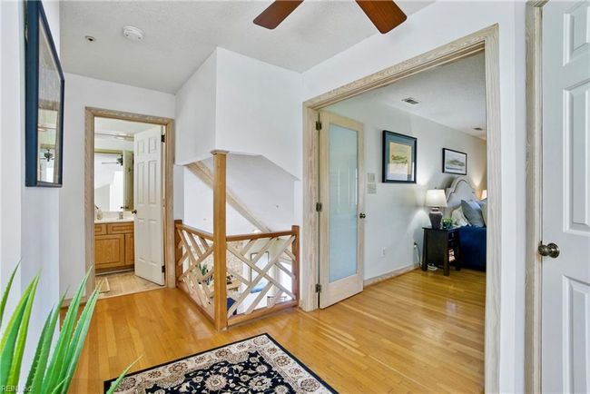 The french doors open up to the primary bedroom suite. | Image 24