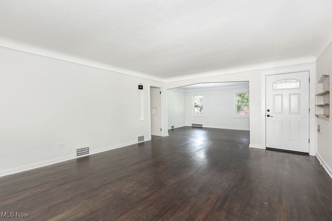 Entryway with dark hardwood / wood-style floors | Image 11