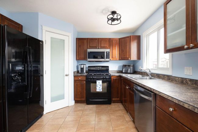 129 Honeysuckle Way, House other with 5 bedrooms, 4 bathrooms and 2 parking in Fort Mcmurray AB | Image 7