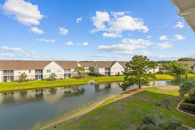 Water view with nearby suburban area | Image 22