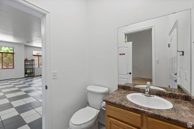 Half bathroom with vanity and toilet | Image 69