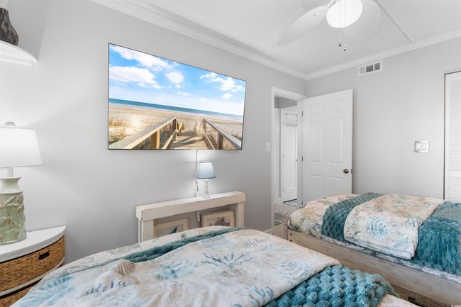 Bedroom featuring ornamental molding and ceiling fan | Image 20