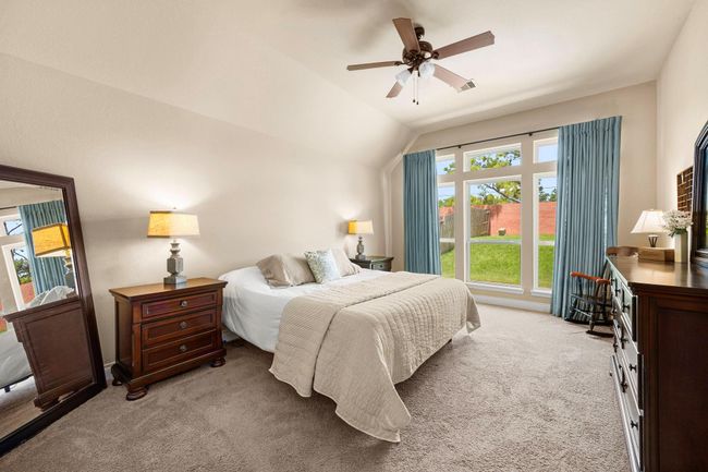 Spacious primary bedroom with large windows! | Image 17