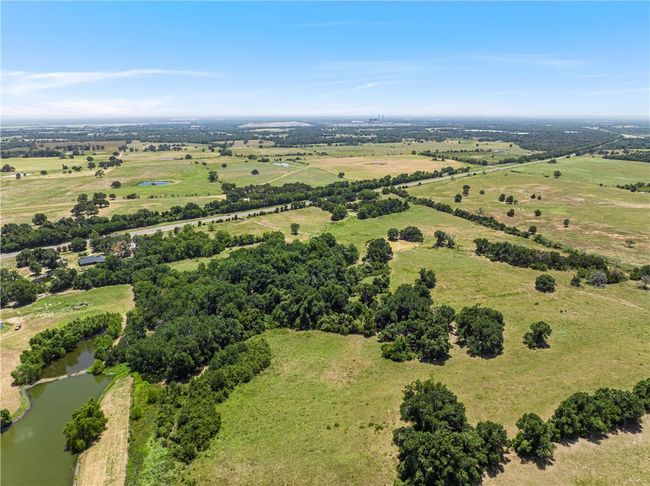 Drone / aerial view featuring a water view and a rural view | Image 6