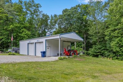 The pole barn is complete with concrete floor, electric and insulation. | Image 3