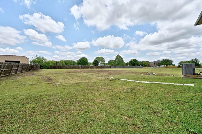 View of yard with central AC unit | Image 31