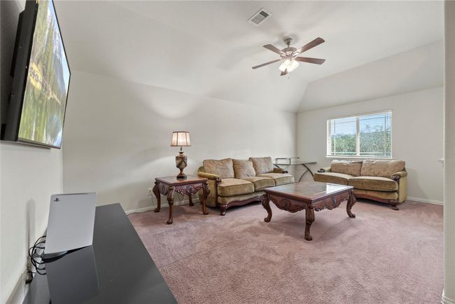 Whether utilized as an additional family space or a teen hangout area, the 2nd floor bonus room offers a multitude of possibilities. Easily arrange a couch and television for daily enjoyment and add a pool table or chess board for some friendly competition! | Image 26
