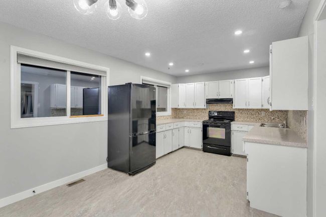 616 55 Street Se, Home with 5 bedrooms, 2 bathrooms and 2 parking in Calgary AB | Image 14