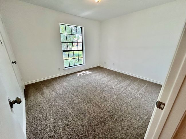 Empty room with carpet flooring and baseboards | Image 16