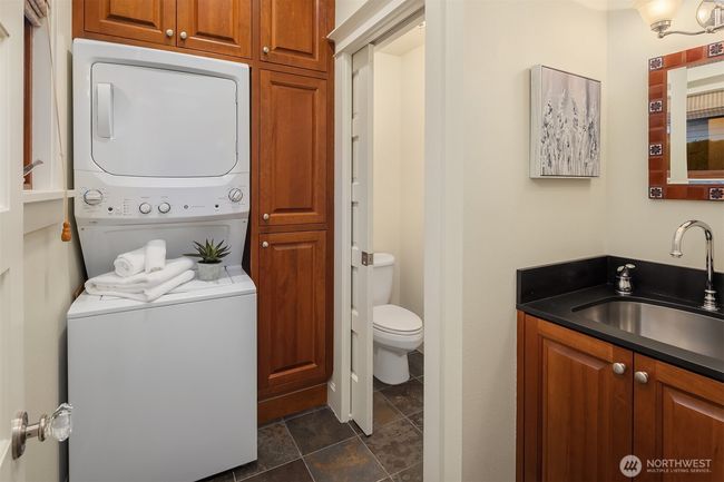 Laundry and second main floor 1/2 bath. | Image 24