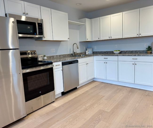156 S Main St, House other with 5 bedrooms, 4 bathrooms and 3 parking in Suffield CT | Image 6
