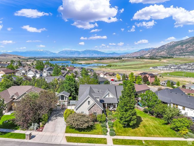 Aerial view of residential area featuring a water and mountain view | Image 60