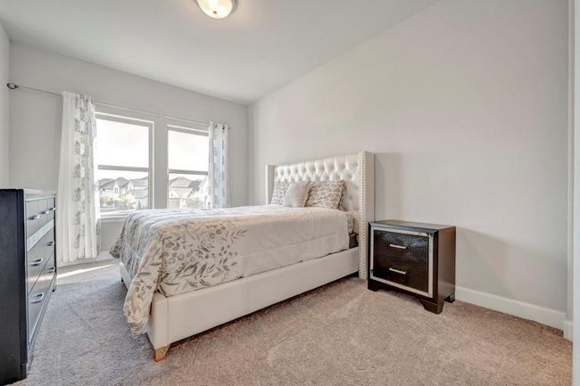 4th secondary room looks out over the backyard. | Image 29