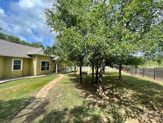 View of yard featuring fence | Image 23
