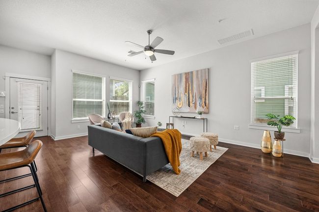 The spacious living room offers endless possibilities—whether you're hosting friends, curling up with a good book, or enjoying a quiet evening in, this space adapts to your lifestyle | Image 11
