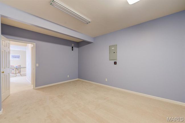 We can't call it a bedroom, but it is a lovely space with carpet and bright lights. | Image 34