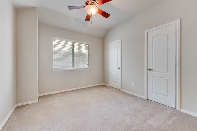 This additional bonus room up has a double closet and can serve as a playroom, bedroom, office or secondary Primary Suite. | Image 21