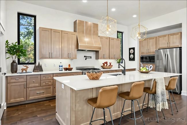 View of kitchen from Living/Family Room area (virtually staged) | Image 20