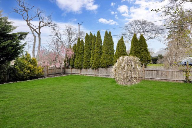 View of yard featuring a fenced backyard | Image 26