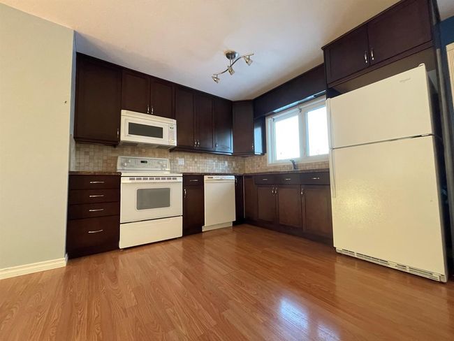 5209 49 Street, House other with 4 bedrooms, 2 bathrooms and 4 parking in Kitscoty AB | Image 6
