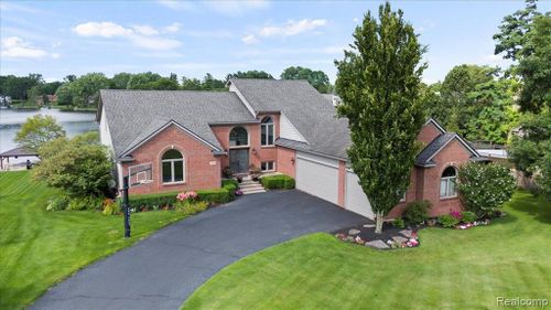 9042 Softwater Woods Drive, Springfield Twp, MI, 48348 | Card Image