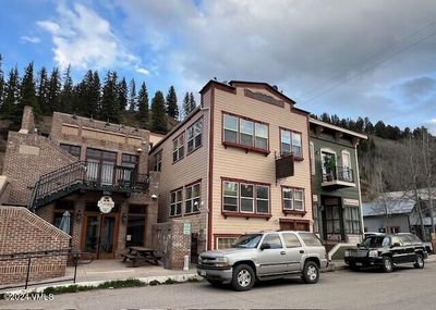 Redcliff town center where old west wranglers mix with sled heads and powder hounds. Post office across street and world famous Mangos just two beers and a short stumble away! | Image 3