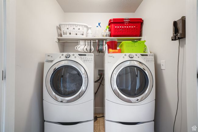 Laundry area with separate washer and dryer | Image 19