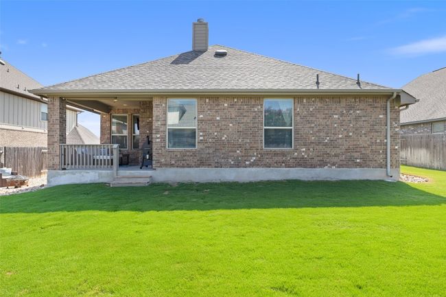 The level lawn offers low-maintenance green space with room to customize or enjoy as-is. | Image 33
