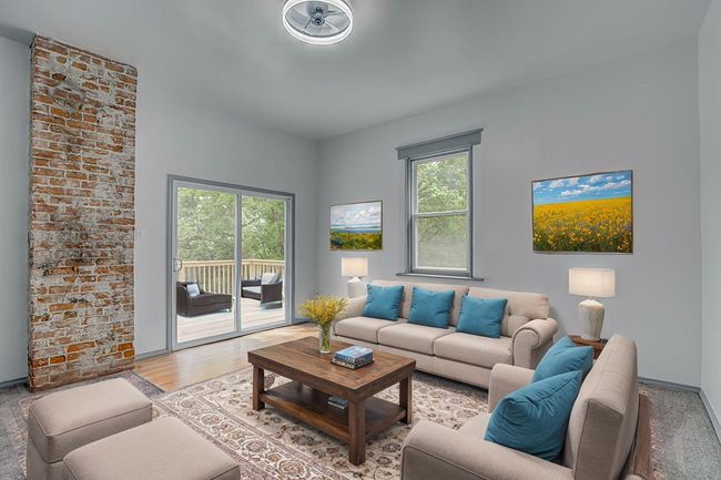 Virtual staged as a family room. What do you think you will make it? | Image 12