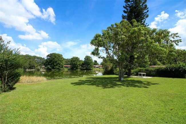 Another view of backyard and lovely lake views. | Image 29