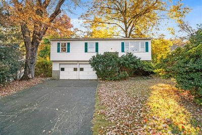 View of front facade featuring a garage | Image 1