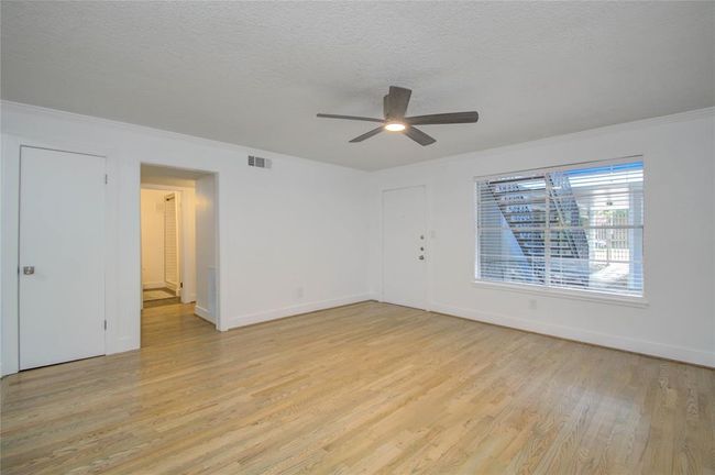 Another view of the Living area - Ceiling fans located in each room. | Image 4
