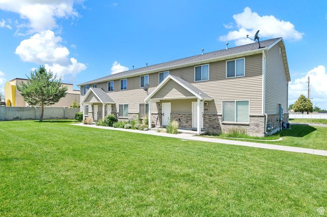 View of front facade featuring brick siding | Image 24